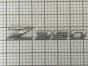 Nissan 350Z 2003-2008 maletero puerta levadiza emblema letras genuino OEM - Imagen 1 de 2
