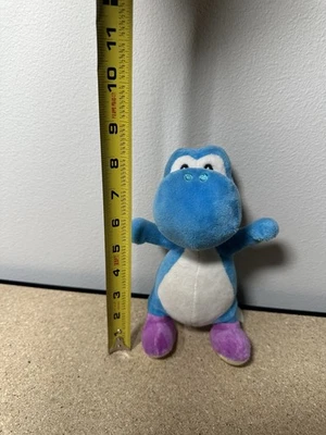 Peluche Yoshi azul claro Super Mario All Star Collection Foto 1 de 2