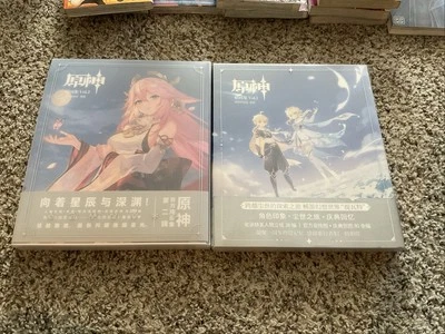 Official Genshin Impact Illustrated Collection Vol. 1 & 2 Art Book With benefits - Image 1 of 4