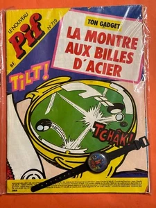 PIF GADGET N° 719 AVEC GADGET LA MONTRE AUX BILLES D ACIER TTBE - Imagen 1 de 1