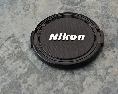 Retro Genuine Nikon NIKKOR 58mm Snap-on Front Lens Cap (#1279) - Image 1 of 2