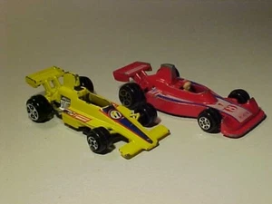 LOTTO: F1 Lola T370 & Hesketh 308 Yat Ming #1311 & #1308 1/64 pressofuso usato sfuso - Foto 1 di 7