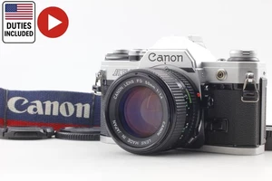 [NEUWERTIG + Trageriemen] Canon AE-1 analoge Silberkamera + neues FD 50mm f/1.4 Objektiv aus JAPAN - Bild 1 von 18