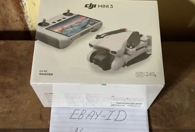 DJI Mini 3 Camera Drone (with RC Remote) Brand New Sealed - Image 1 of 4