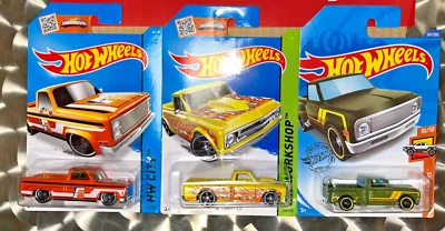 JUEGO DE 3 CAMIONETAS CHEVY 1983 MARCO, 1967 C10, 1969 SPORTSIDE 1/64 de Hot Wheels Foto 1 de 4