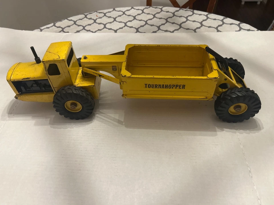 VINTAGE 1950’S NYLINT TOYS YELLOW TOURNEAU TOURNAHOPPER PRESSED STELL DUMPER - Image 1 of 4