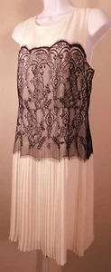 Falda plisada para mujer TRUELY POPPY marfil con superposición de encaje negro cambio... - Imagen 1 de 5