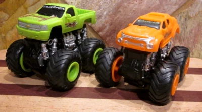 2 Chevy  4X4 Monster Trucks 1:32 Pull Back Friction Vehicles - Image 1 of 4