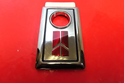 New GM OEM 1985 Oldsmobile Trunk Calais trunk lock emblem cover badge NOS - Image 1 of 4