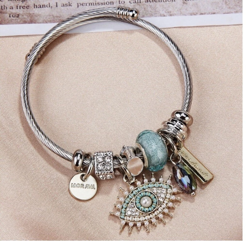Pulsera con dije de mal de ojo Morava plateada ajustable de acero inoxidable Foto 1 de 1