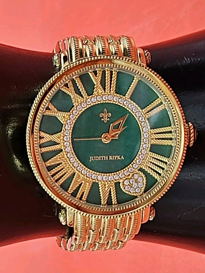Reloj Judith Ripka London tono dorado verde. Batería nueva.  Foto 1 de 4