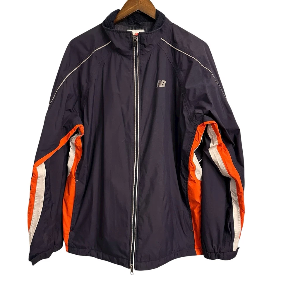 Chaqueta cortavientos New Balance vintage forrada con cremallera completa azul marino naranja grande para hombre Foto 1 de 4