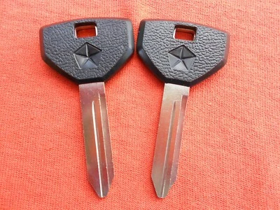 2 DODGE CHRYSLER PLYMOUTH PENTASTAR NOS KEY BLANKS 94 1995 1996 1997 1998 1999 - Image 1 of 2