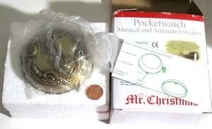 MR. CHRISTMAS TASCHENUHR MUSIKALISCHE UND ANIMIERTE SKATER - PFERD & BUGGY - NEU IN VERPACKUNG - Bild 1 von 10
