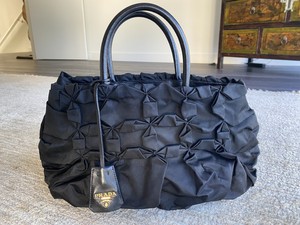prada chest bolsa