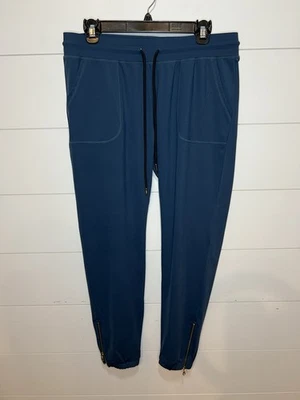 Pantalones de chándal Zyia Active verde azulado con cremallera al tobillo grandes para mujer Foto 1 de 4