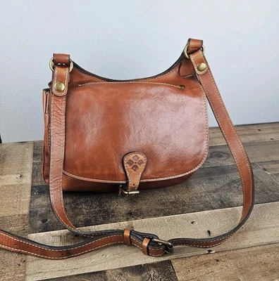 Bolso Bandolera Patricia Nash London Cuero Heritage Vintage Sillín - Cuero Tostado Foto 1 de 4