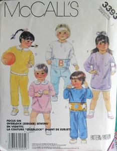 VTG McCalls 3393 Baby 12mo Toddler 1 Knit Overlock Sweat Top Dress Pants Pattern - Picture 1 of 2