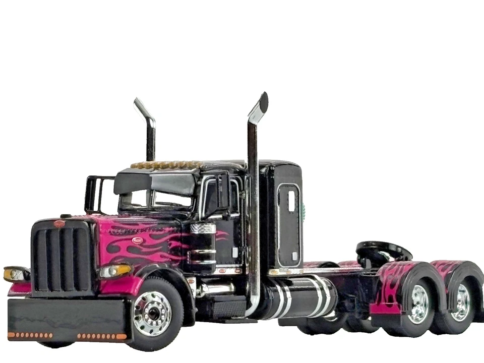 1/64 DCP BLACK/PINK PETERBILT 389 W/ 36" SLEEPER - Image 1 of 4