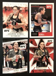 LOT OF 4 DIFFERENT 2021 PANINI CHRONICLES UFC AMANDA NUNES CARDS ORIGINS PRESTIG - Picture 1 of 6