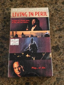 BRAND NEW Living In Peril (VHS; 1998) Rob Lowe RARE Sealed OOP Watermarks - Picture 1 of 6