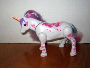 Juguete electrónico Little Live Pets Shimmer My Dancing Unicorn colores arco iris - Imagen 1 de 4