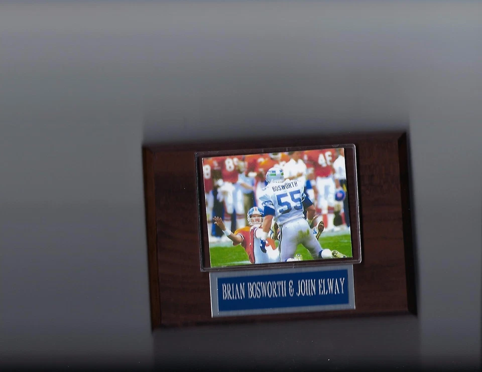 BRIAN BOSWORTH & JOHN ELWAY PLACA SEATTLE SEAHAWKS DENVER BRONCOS FÚTBOL AMERICANO NFL Foto 1 de 1