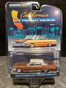 1/64 GREENLIGHT CALIFORNIA LOWRIDERS 1973 CADILLAC SEDAN DEVILLE METALLIC BROWN - Picture 1 of 2