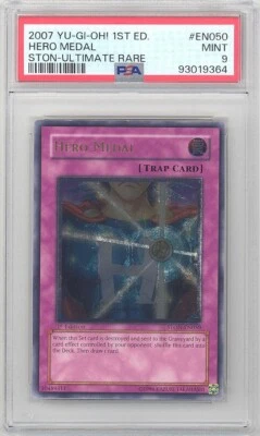 PSA 9 - Yu-Gi-Oh Card - STON-EN050 - HERO MEDAL (ultimate) *1st Edition* - MINT - Image 1 of 2