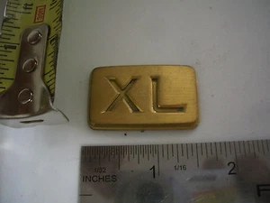 TOYOTA XL LETTERS GOLD COLOR EMBLEM BAGDE OEM ORIGINAL - Picture 1 of 1