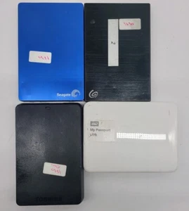 Lot of 4 Portable hard drive 1 TB different brands check the description - Picture 1 of 4