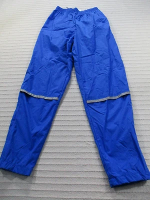 Pantalones Nike para niños azul medio resistente al viento cintura elástica bolsillos elásticos nailon Foto 1 de 4