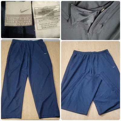 Pantalones deportivos Nike azules talla 2XL para hombre etiqueta plateada logotipo Swoosh cremallera inferior Foto 1 de 4