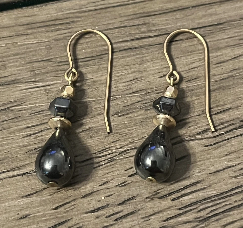Hematite Teardrop Dangle Earrings with Gold Tone Accents Hook - Image 1 of 1