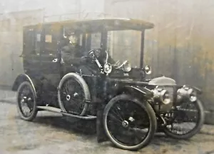 Altes Antikauto mit Chauffeur Foto Speichenräder Taxi? - Bild 1 von 6