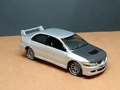 2004 MITSUBISHI LANCER EVOLUTION LIMITED EDITION COLLECTIBLE 1/64 SILVER TUNER - Image 1 of 4