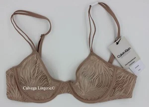 Reggiseno nuovo con etichette Calvin Klein QF7103 ""Clear Marquisette"" mezza coppa morbida convertibile, beige - Foto 1 di 8