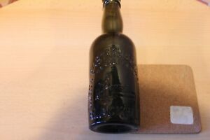 NORTH EASTERN BREWERIES BOTTLE - BLACKHILL - DRAYMAN ON DELIVERY TRUCK