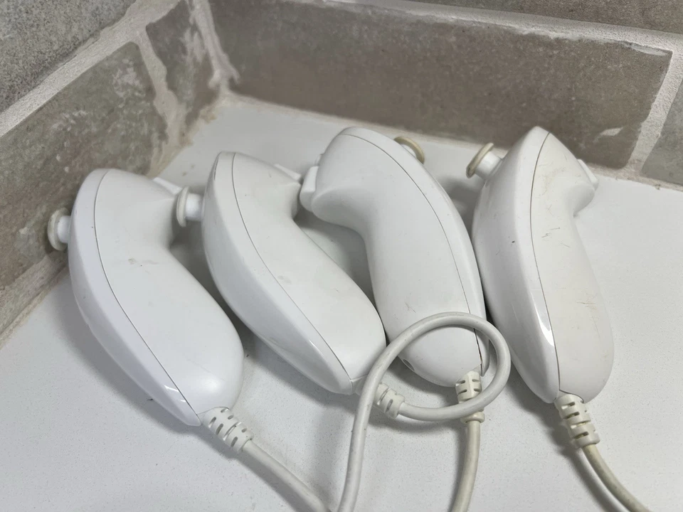 Nintendo Nunchuck Controllers Lot Of 4 Official OEM Nintendo Wii Or Wii U - Image 1 of 4