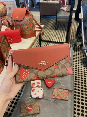 NWT Coach Travel Envelope Wallet Signature Canvas Wild Strawberry Print CH524 - Image 1 of 4