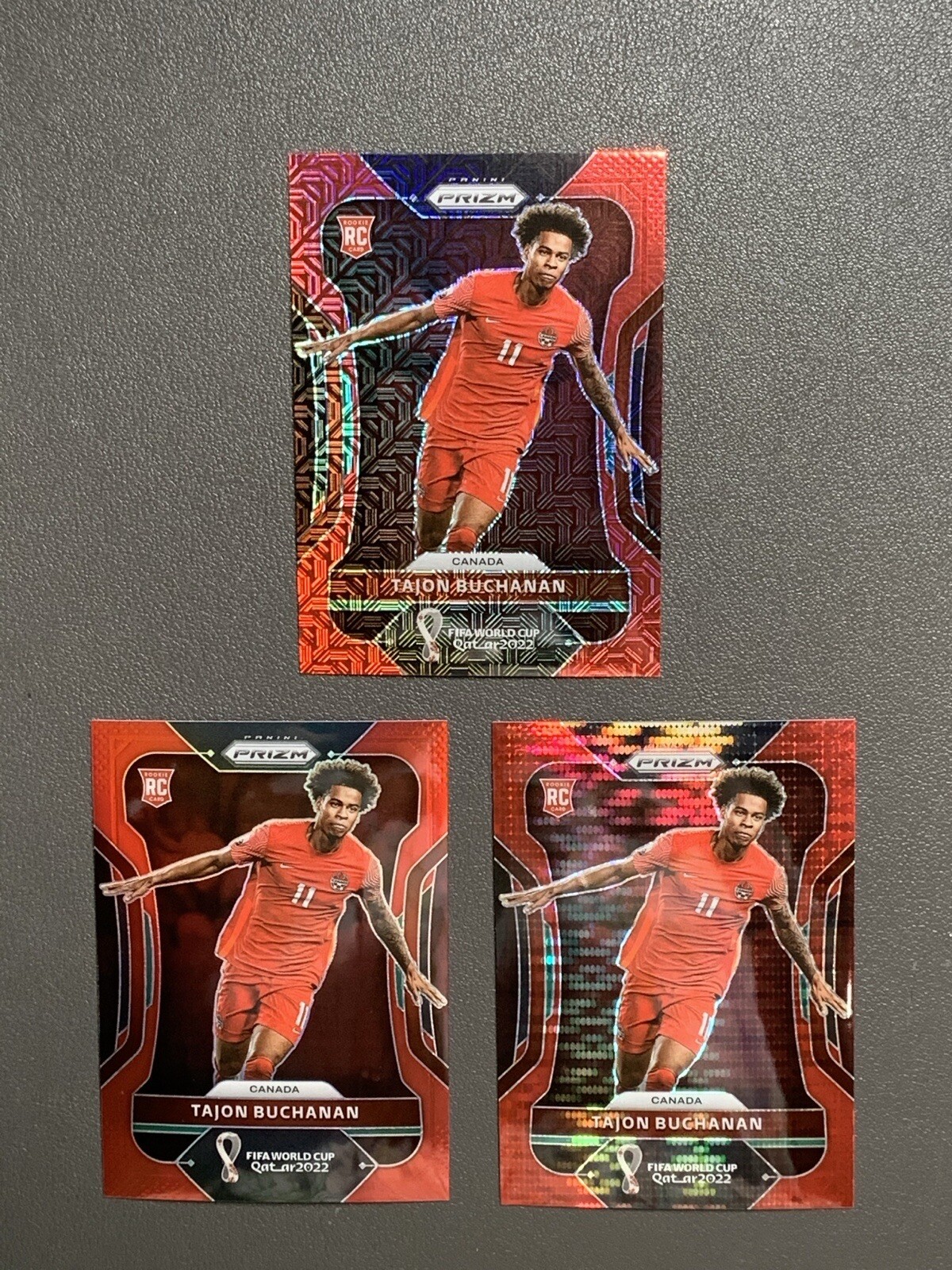 2022 Prizm World Cup TAJON BUCHANAN Rc Red Mojo Pulsar /99 /399 CANADA!