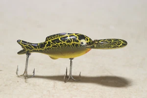 Señuelo vintage Heddon Crackleback negro/amarillo - Imagen 1 de 7