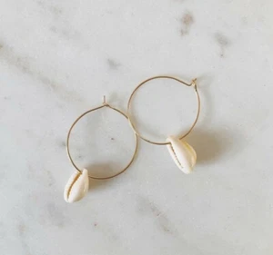 Dainty gold hoop earrings with an artificial white shell - Picture 1 of 1
