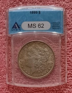 1899 Morgan Dollar, ANACS MS62, bright and golden toned specimen - Picture 1 of 6