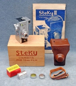 FOTOCAMERA SUBMINIATURA RIKEN STEKY IIIB CON SCATOLA, CUSTODIA, PELLICOLA, TAPPO, FILTRO GIALLO & IB - Foto 1 di 3