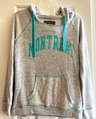 Sudadera con Capucha Montreat Kangaroo Bolsillo Gris Jaspeado con Acentos Verdesas Talla M Usada en Excelente Condición Foto 1 de 4