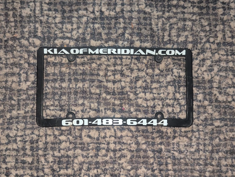 Kia Of Meridian Mississippi License Plate Frame Dealer  - Image 1 of 1