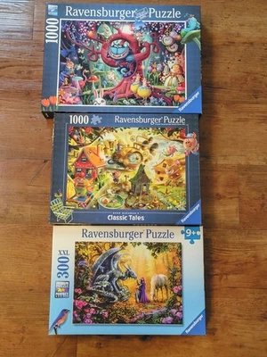 Lot Of (2) 1000  & (1) 300 Piece Ravenburger Jigsaw Puzzles, Alice in Wonderland - Image 1 of 4