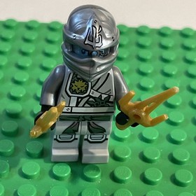 LEGO&reg; Ninjago&trade; Minifigure Silver Zane Titanium 2 Gold Sai Weapons 70748