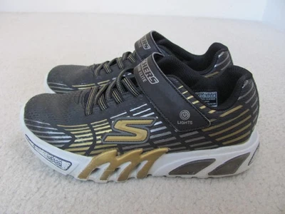 Zapatos iluminados Skechers Flex-Glow Elite negros y dorados para niños talla 3,5 Foto 1 de 4